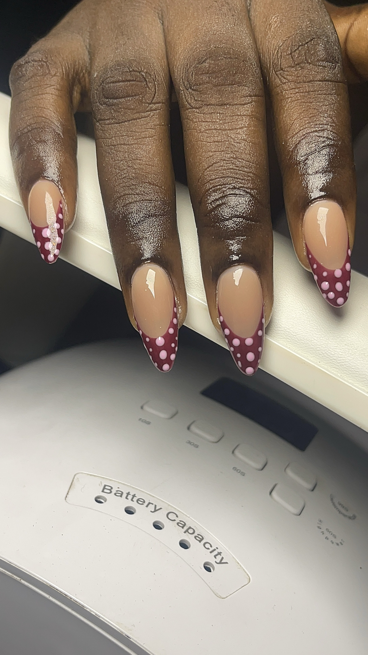 Burgundy polka dot almond-shape acrylic set — Shin Signature Ibadan